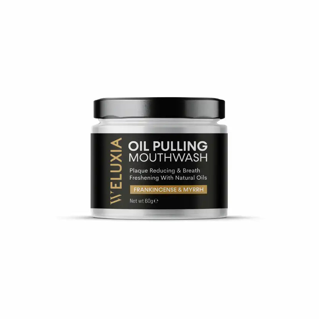 Black and gold labeled jar of oil pulling mouthwash.