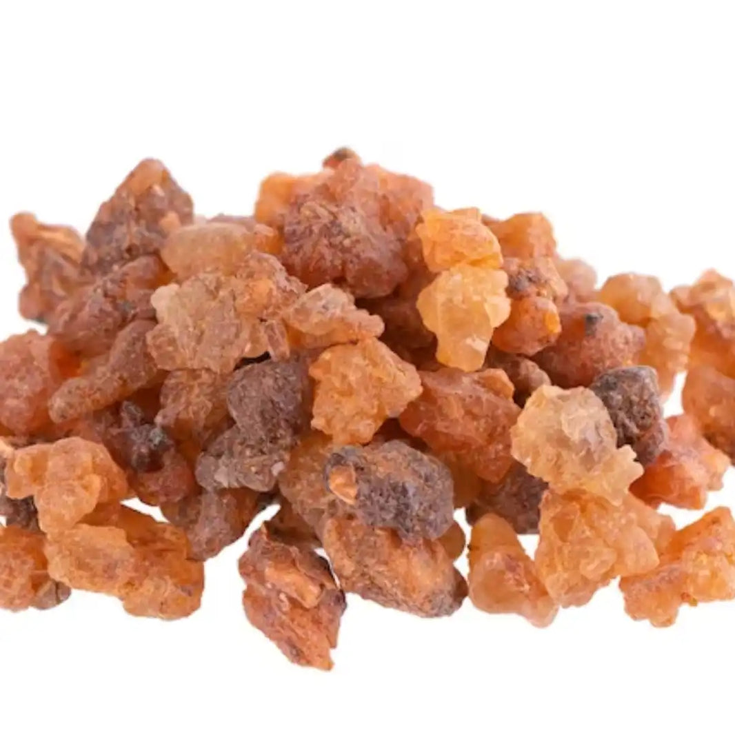 Crystallized chunks of raw brown sugar.