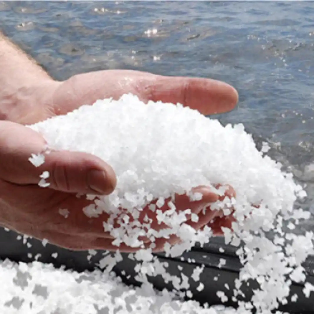 A handful of white sea salt crystals.