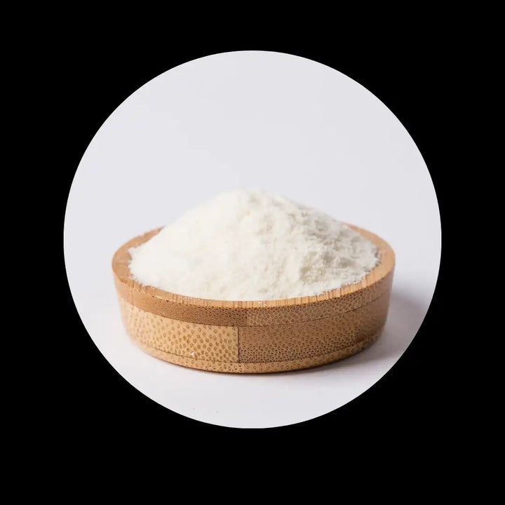 White powder in a round bamboo bowl.